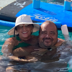 a man and woman in a pool